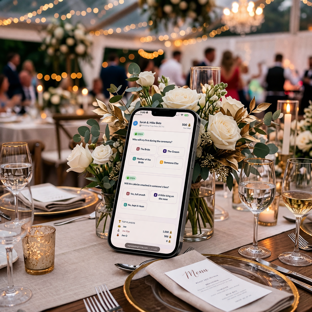 Smartphone displaying an interactive digital wedding prop betting game on a beautifully decorated reception table